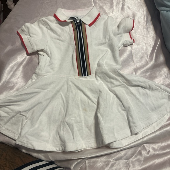 Burberry 18-month-old dress lightly worn. Minor stains originally $180